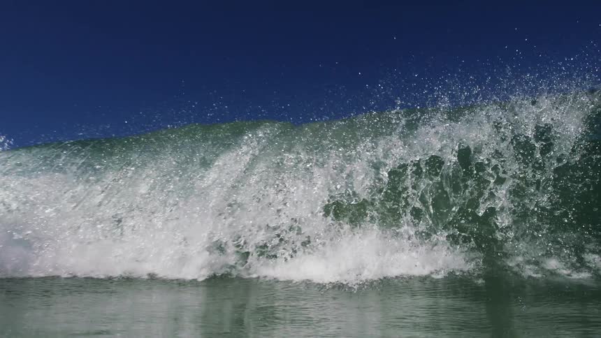 A closeup of a crashing wave