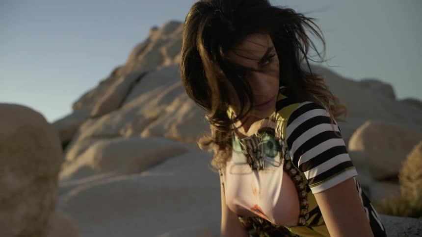 A womans hair blows in the wind