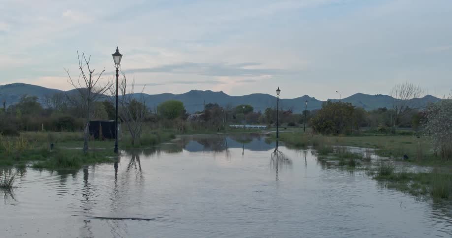 Water floods over a road