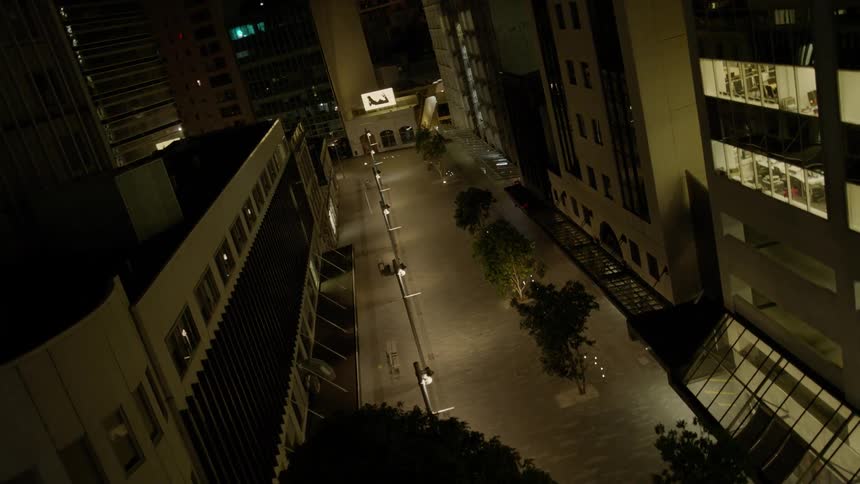 City buildings illuminate the night sky