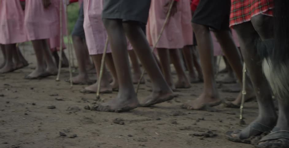 Maasai are dancing in uniforms and native costume