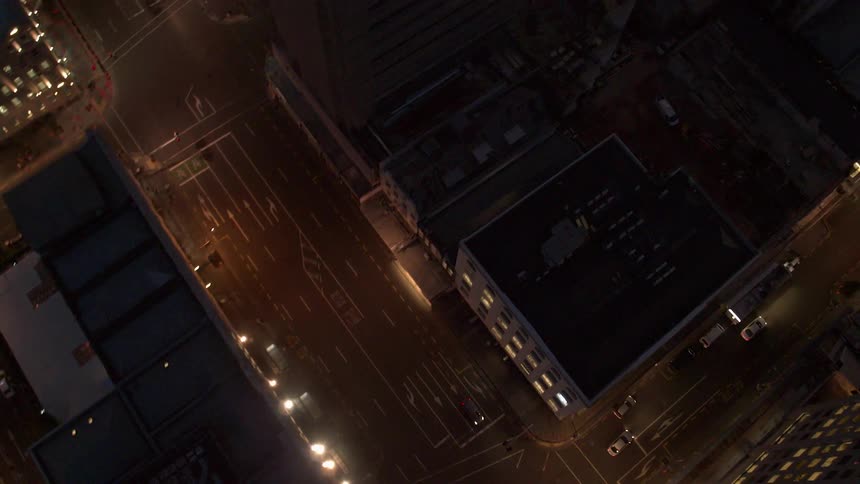 City buildings illuminate the night