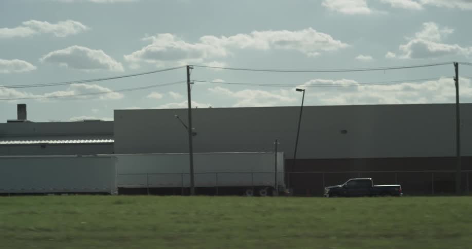 A truck travels on a road
