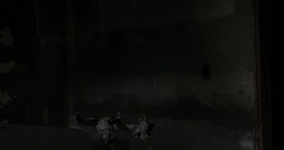 There are people standing ahead on the dark field
