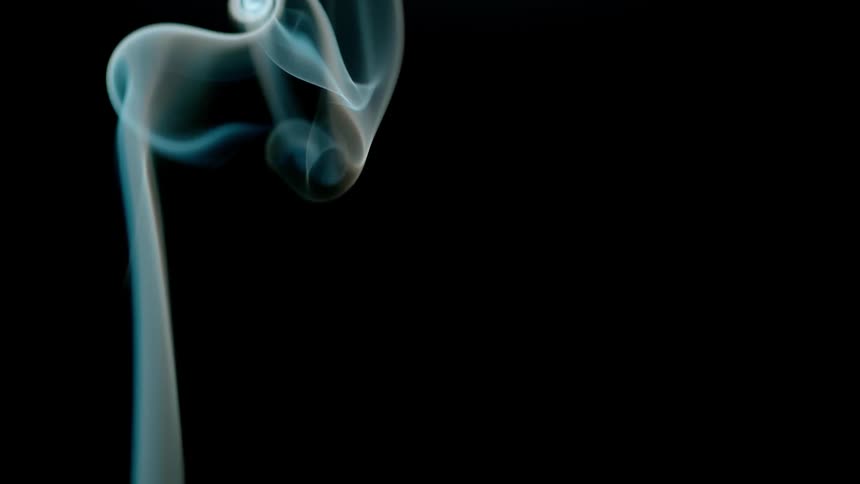 The fire is burning with smoke slowly rising