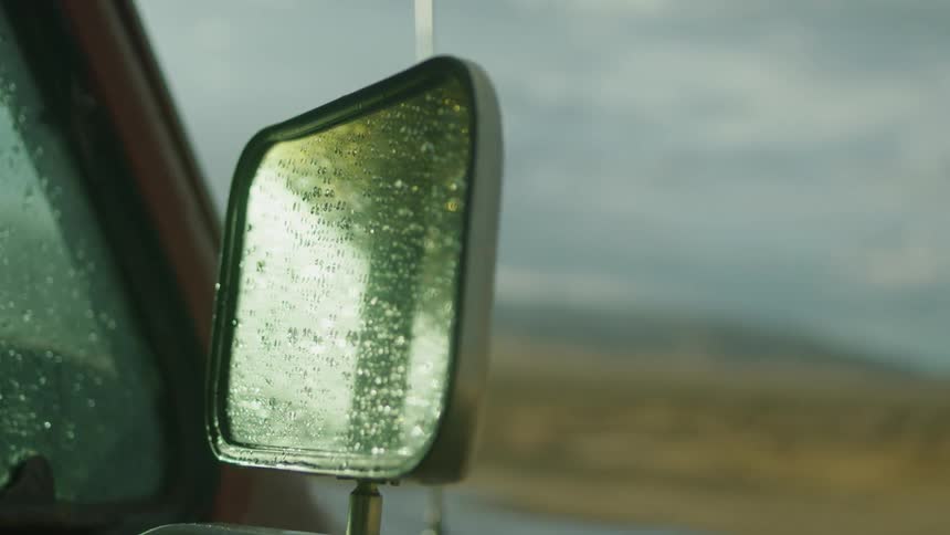 Water beads on a truck outside
