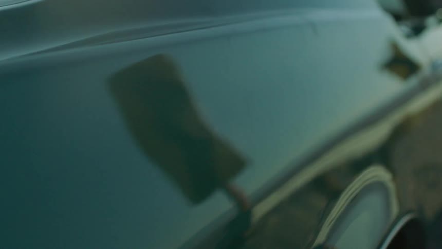 The car is shining reflecting the sun around it