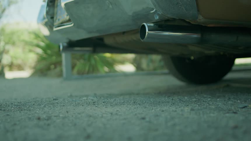 A car sits on concrete