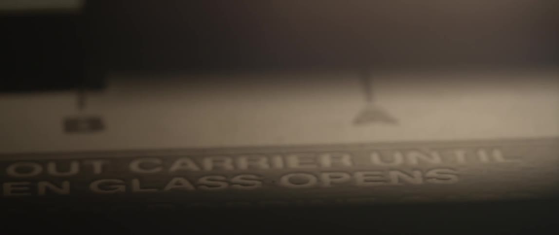 A piece of paper is brought into focus