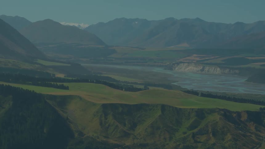 The long green valley is full of hills and mountains