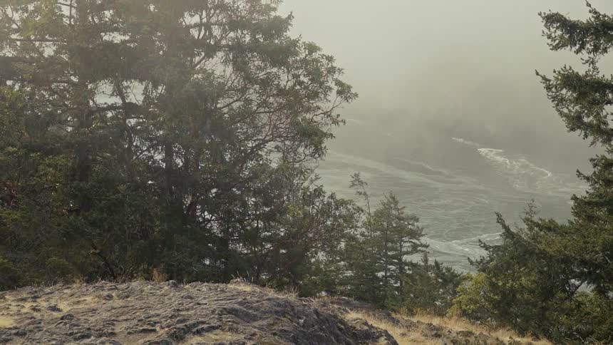 From the top of the mountain the waves hit the shore below