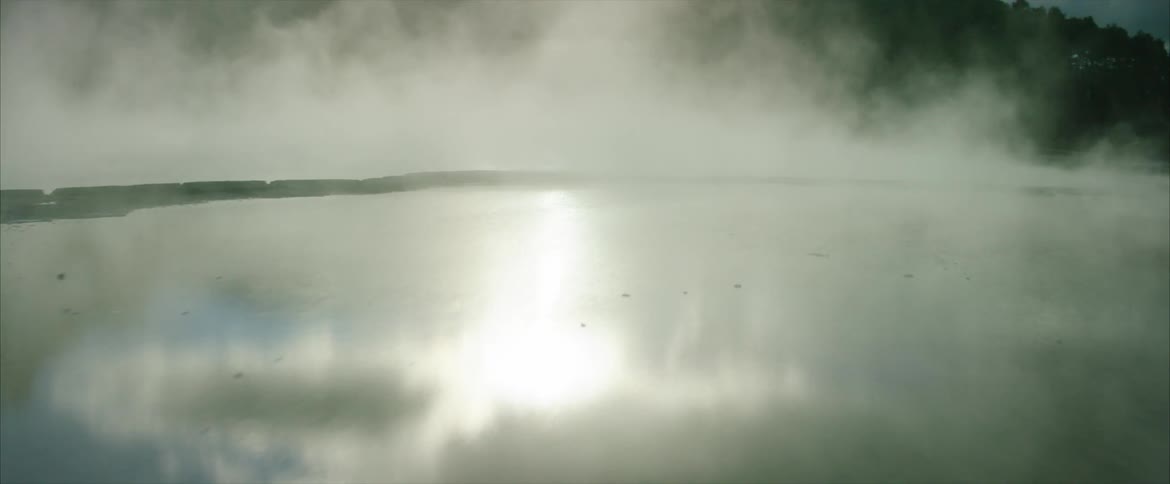 Steam is coming up from a body of water