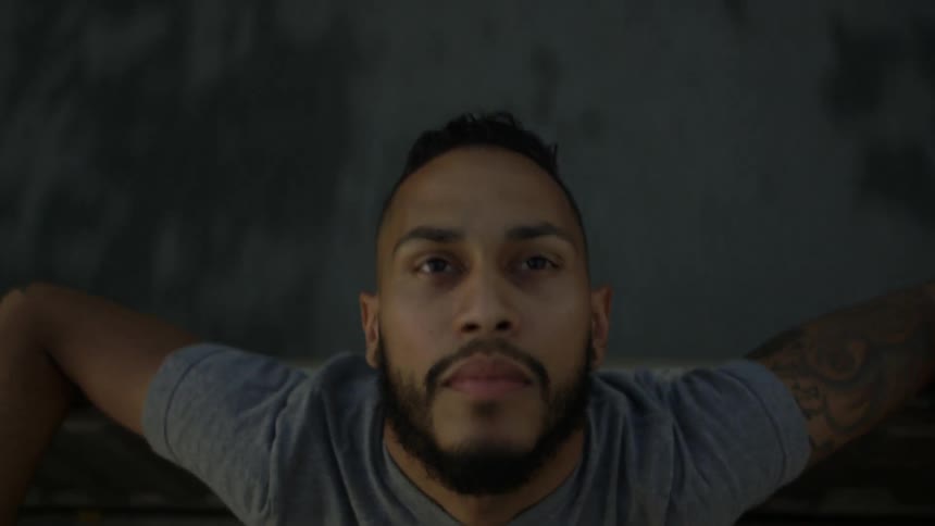 A man stares upward from a vehicle running close to the ground