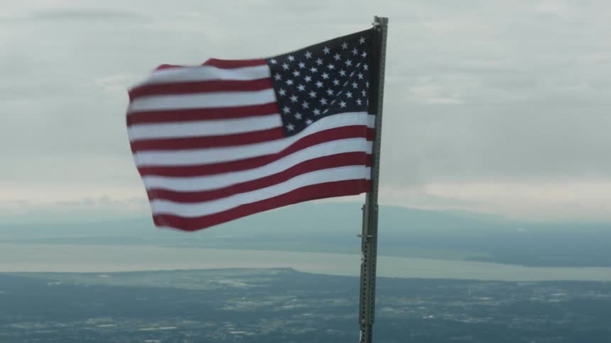 An american flag waves in the breeze
