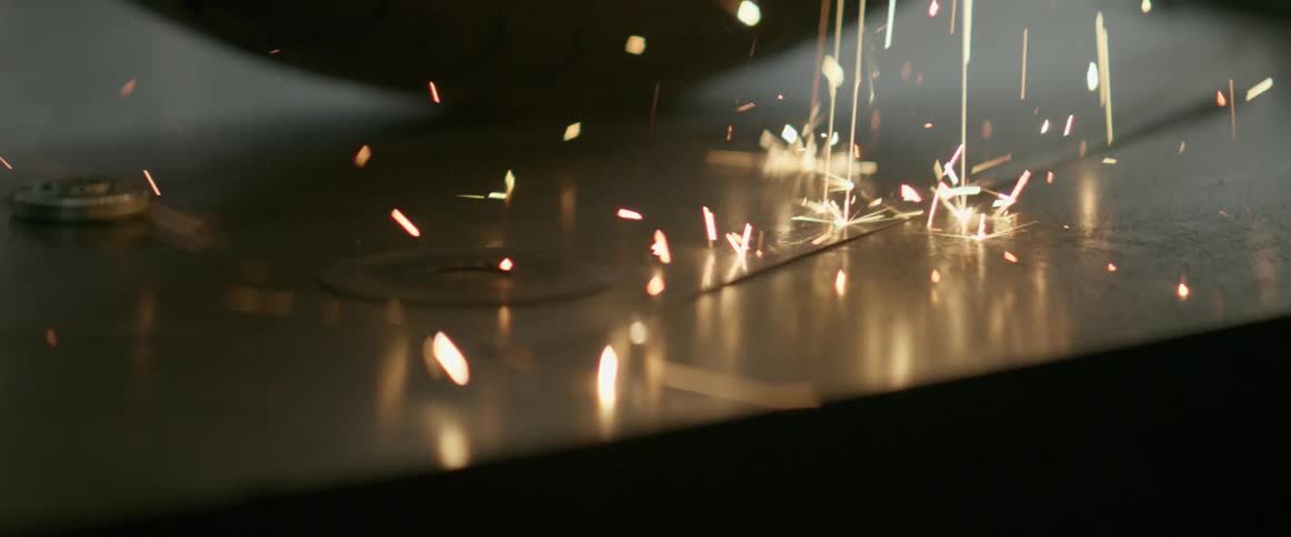 Sparks hitting a metal surface