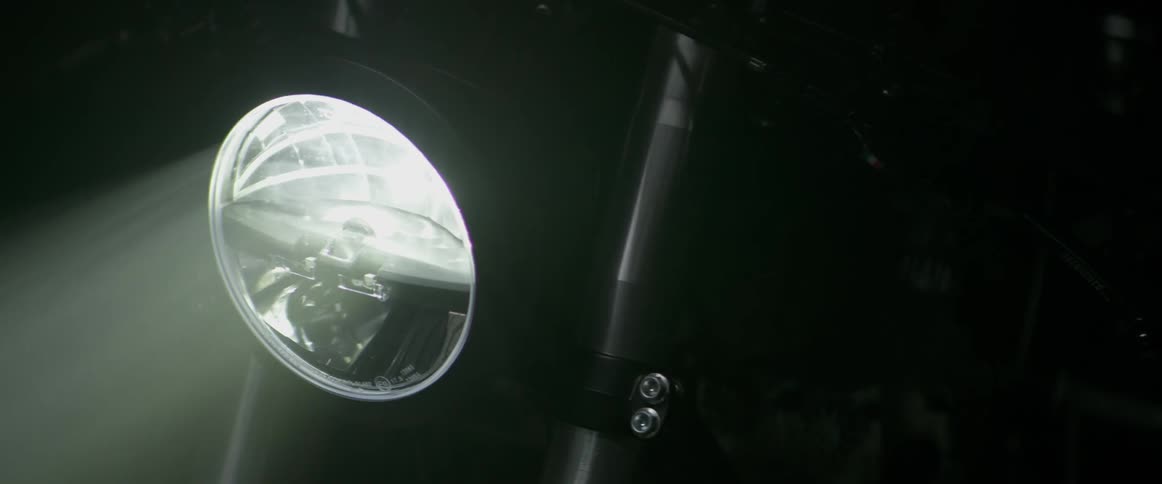 The bright light from the motorcycle turns on