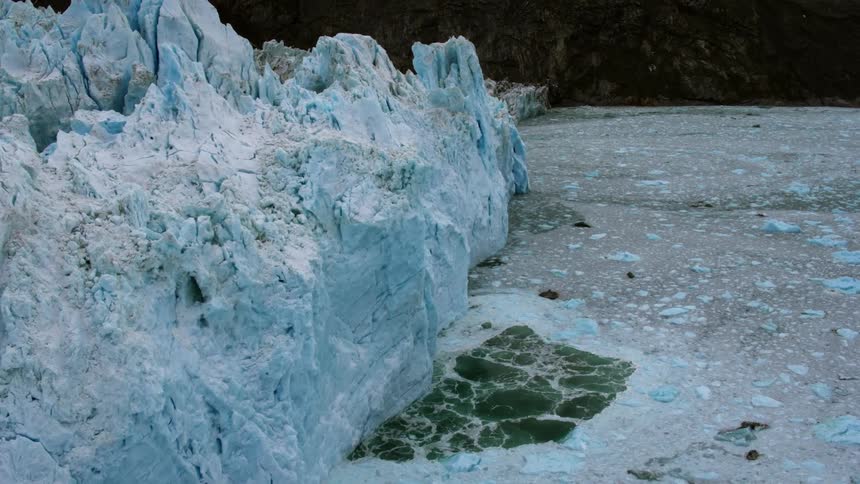 The ice is melting on this iceberg into the water