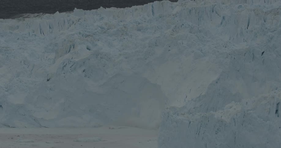 Thick glaciers dusted with snow