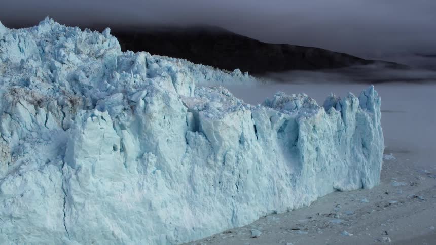 A jagged wall of an iceberg