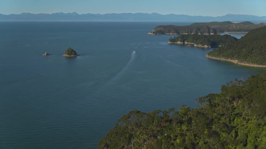 A boat floats on a large body of water