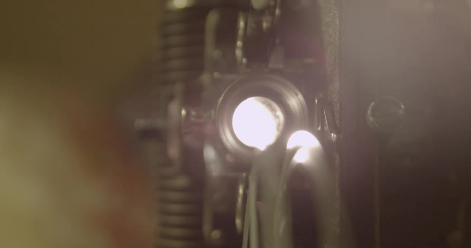 A film canister spinning on a reel
