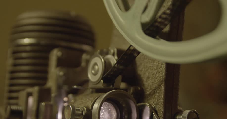 Film is fed through a projector