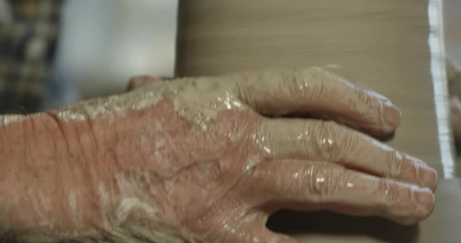 A person making pottery