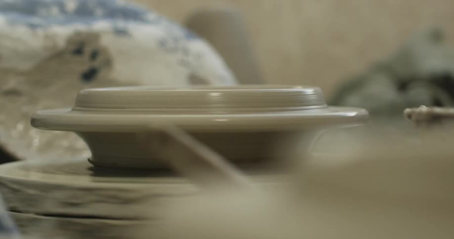 A person is making a bowl