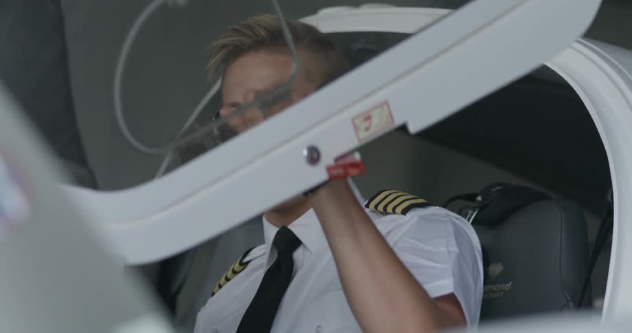 A pilot gets into a plane