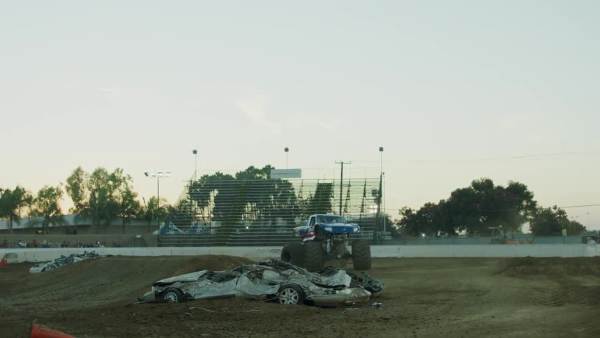 Monster truck spins cookies at demolition derby