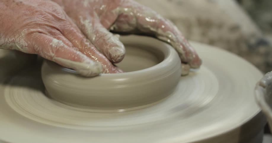 A person making pottery