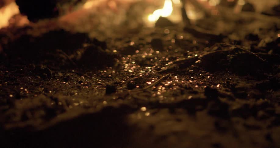 The fire is burning with debris all over the ground