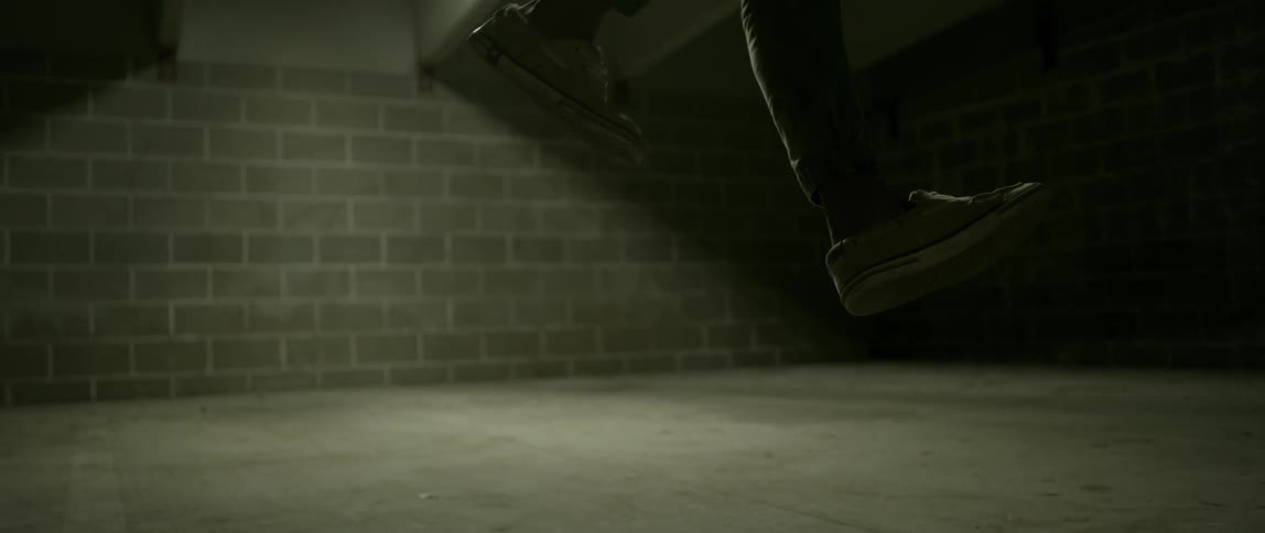 A person moves their feet in the air