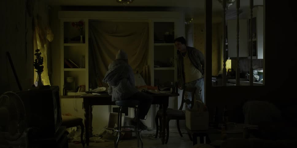 Teenagers talk in a dining room during the day