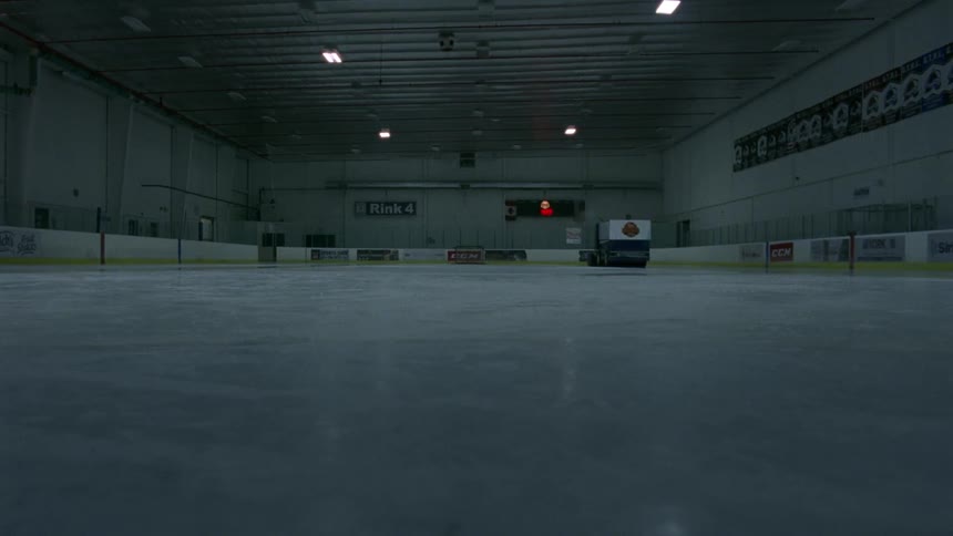 The zamboni resurfaces the ice rink