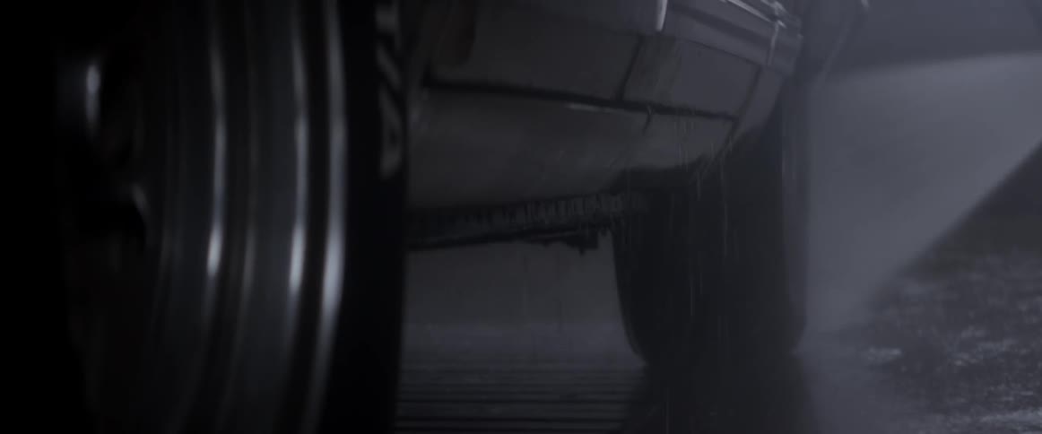 Car outside on a rainy night