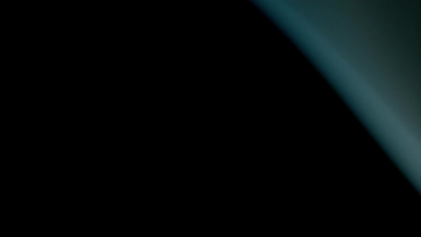 A white object moves in a dark room