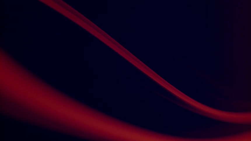 Some red string is being filmed very close up