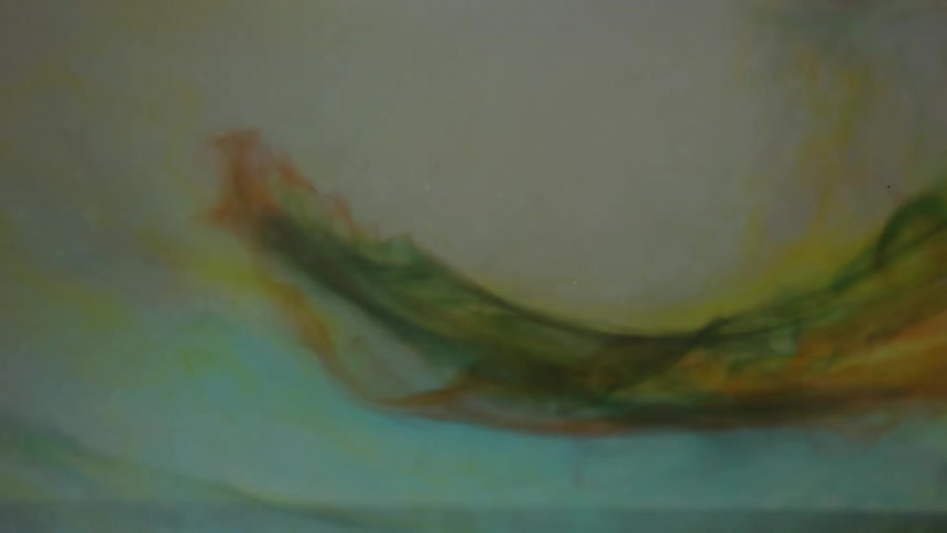 Swirls of color moving around in water