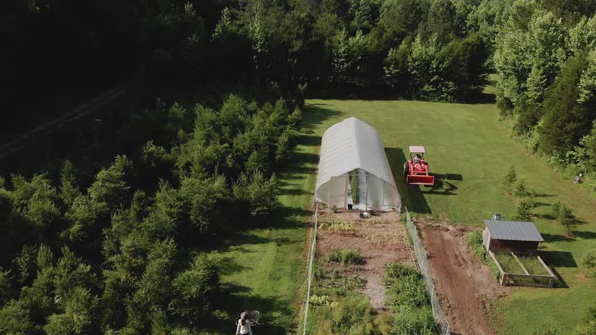 A large outdoor garden is filmed from overhead