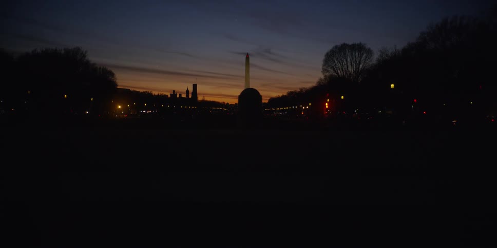 City lights illuminate the night sky