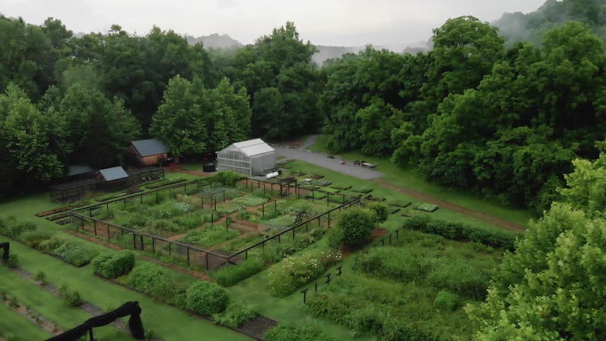 The farm is well maintained with a greenhouse