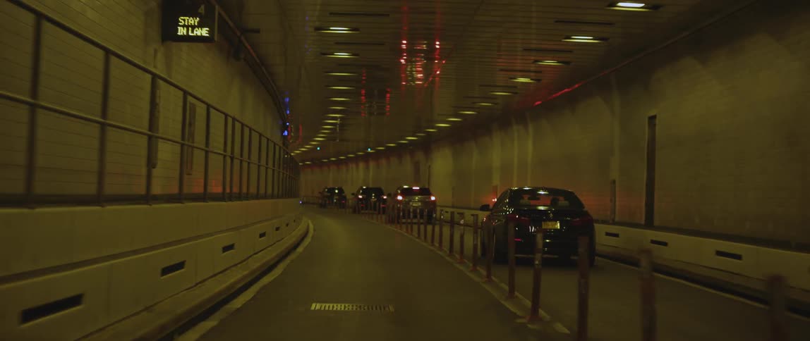 Cars are driving in a tunnel
