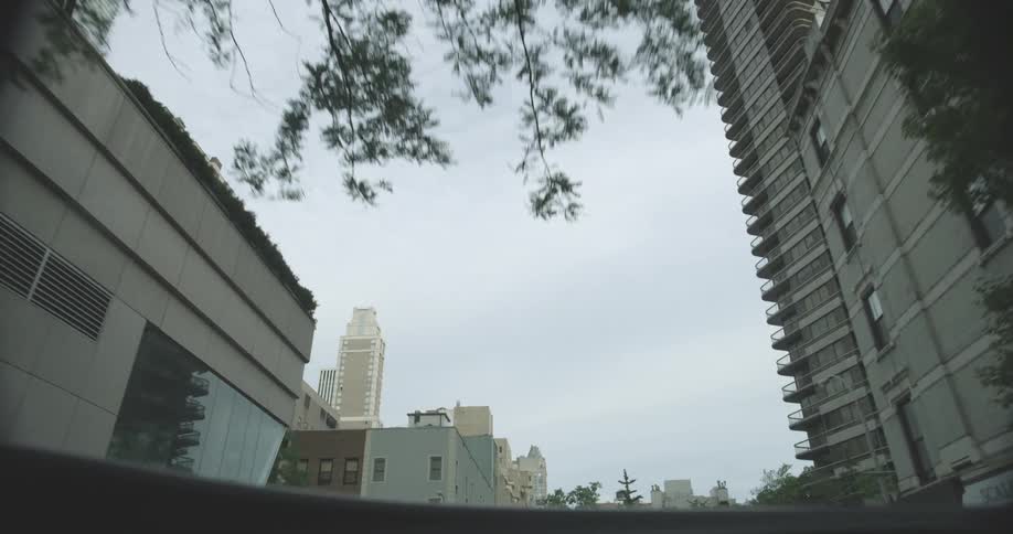 View of some city buildings on a cloudy day