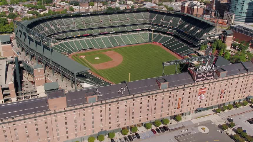 A baseball stadium is filmed from the air
