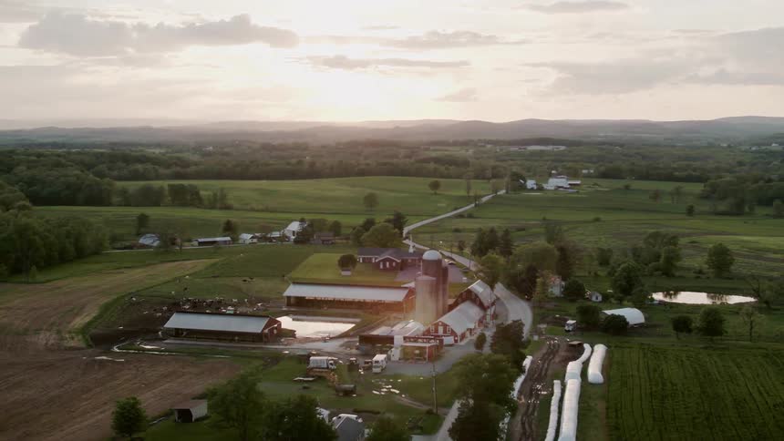 The sun shines on a rural farm