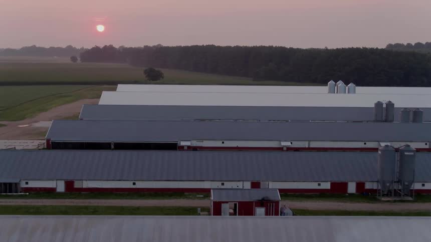 Agricultural buildings near sunset