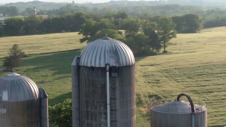 The row of silos line the farm