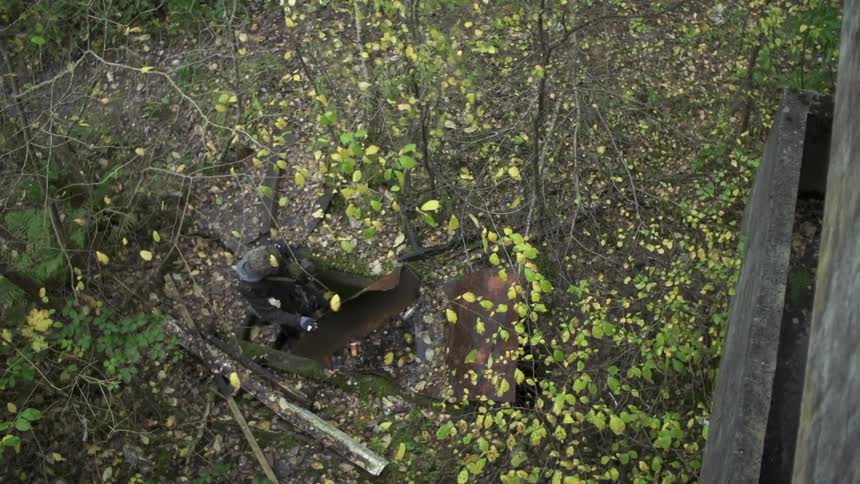 A boy is playing hide and seek