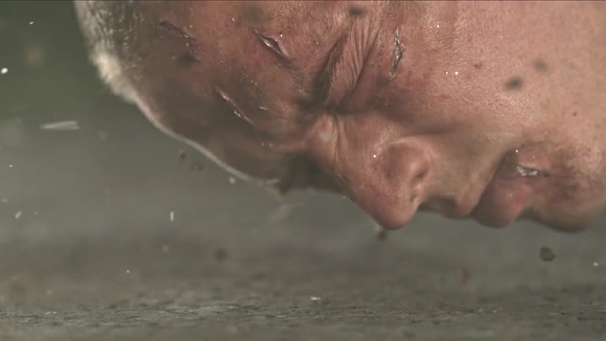 A man's face falls to the ground crushing his face